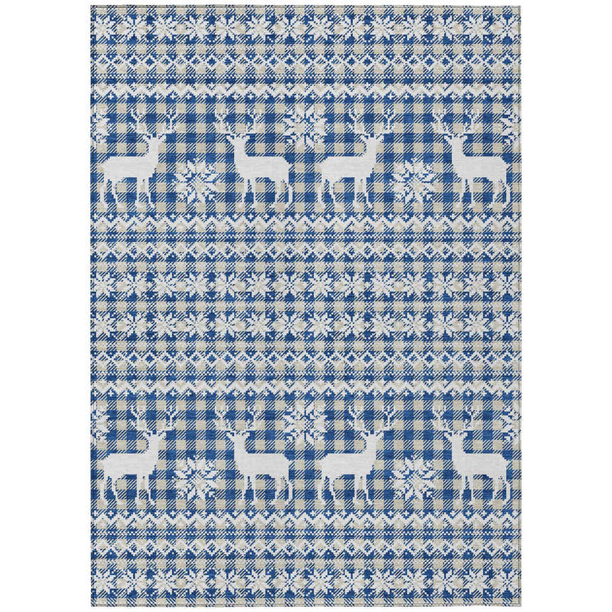 Close-up of the Dalyn Wonderland WN28 Navy Washable Area Rug with a beige and navy plaid pattern and white reindeer. Holiday style.