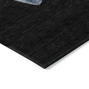 Close-up of the black Dalyn Machine Indoor/Outdoor Wonderland WN34 rug, showing its subtle texture and corner detail.