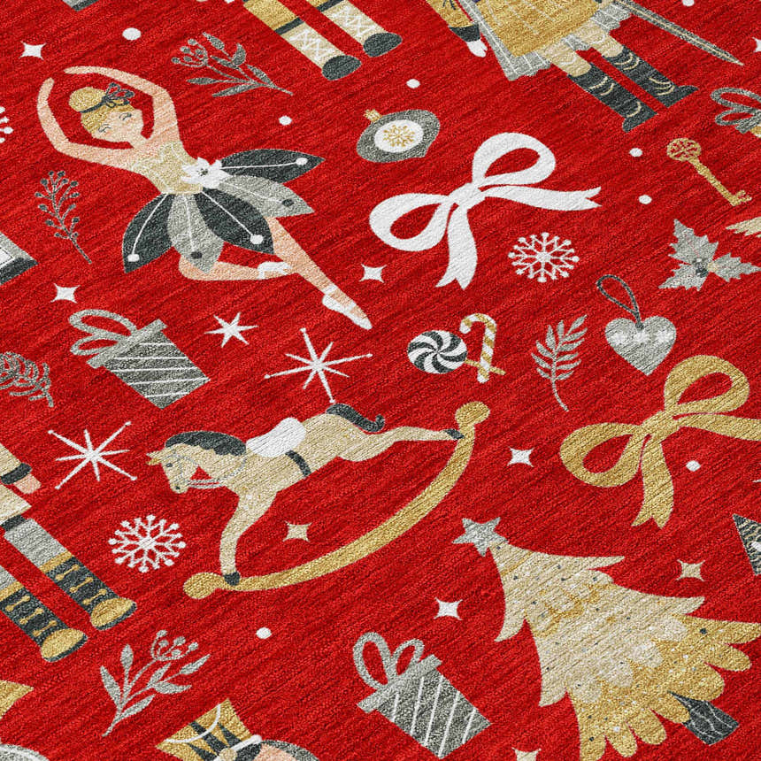 Close-up of Dalyn Wonderland WN35 Red Washable Area Rug with holiday pattern: nutcrackers, ballerinas, gifts, trees, and bows.