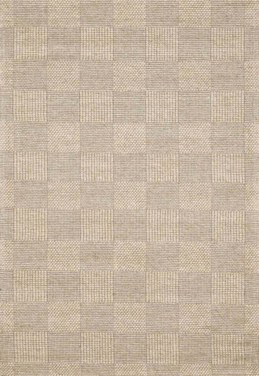Close-up of the Wolseth Area Rug showing a hand-woven, textured, geometric block pattern in ivory and gray. Design-Rectangle-46