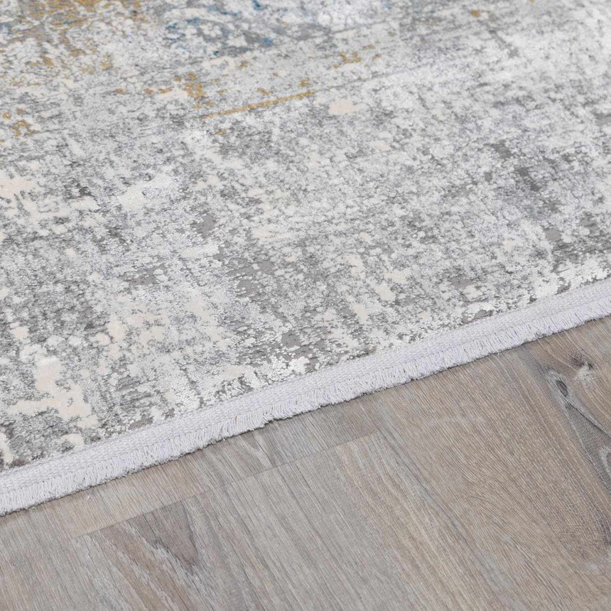 Calion Distressed Blue Luxury Fringed Faux Silk Rug