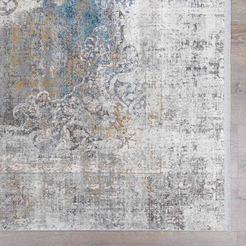 Calion Distressed Blue Luxury Fringed Faux Silk Rug