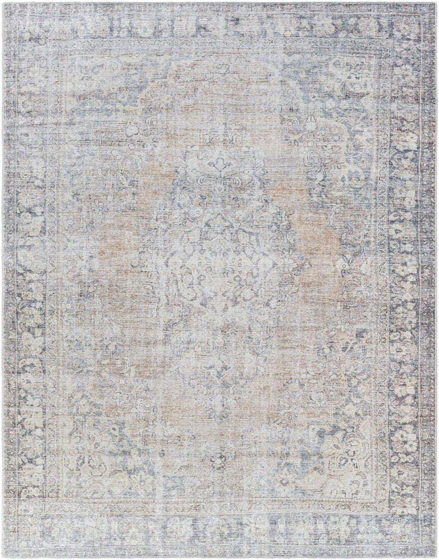 Close-up of the Yachi Washable Area Rug. Traditional style rug in gray, silver, and prairie dust colors with a subtle floral pattern. Design-Rectangle