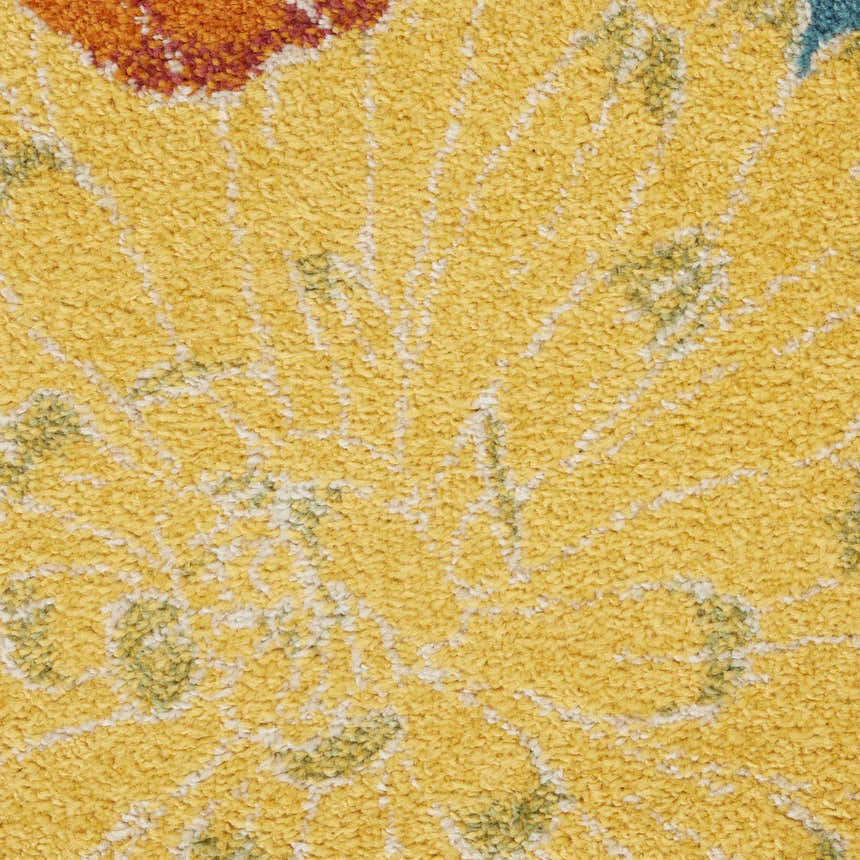 Close up of the textured Nourison Allur Turquoise Multicolor area rug, showing yellow floral pattern.