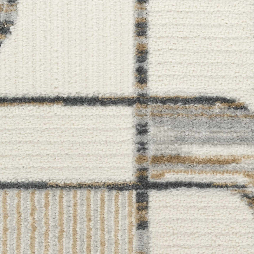 Close-up of Nourison Nordic Ivory Multicolor rug. Features a textured pile with chestnut, gray, and ivory geometric pattern.