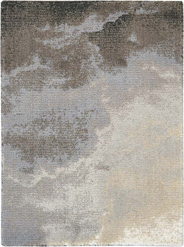 Close-up of Nourison Twilight Storm rug. Abstract pattern in storm gray, beige, and ivory hues. Modern, soft texture.
