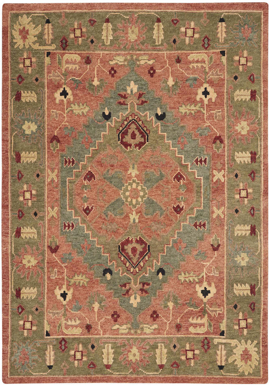 Close-up of the Nourison Tahoe Rust rug. Traditional design with rust, green, and cream floral and geometric patterns. 100% wool texture.