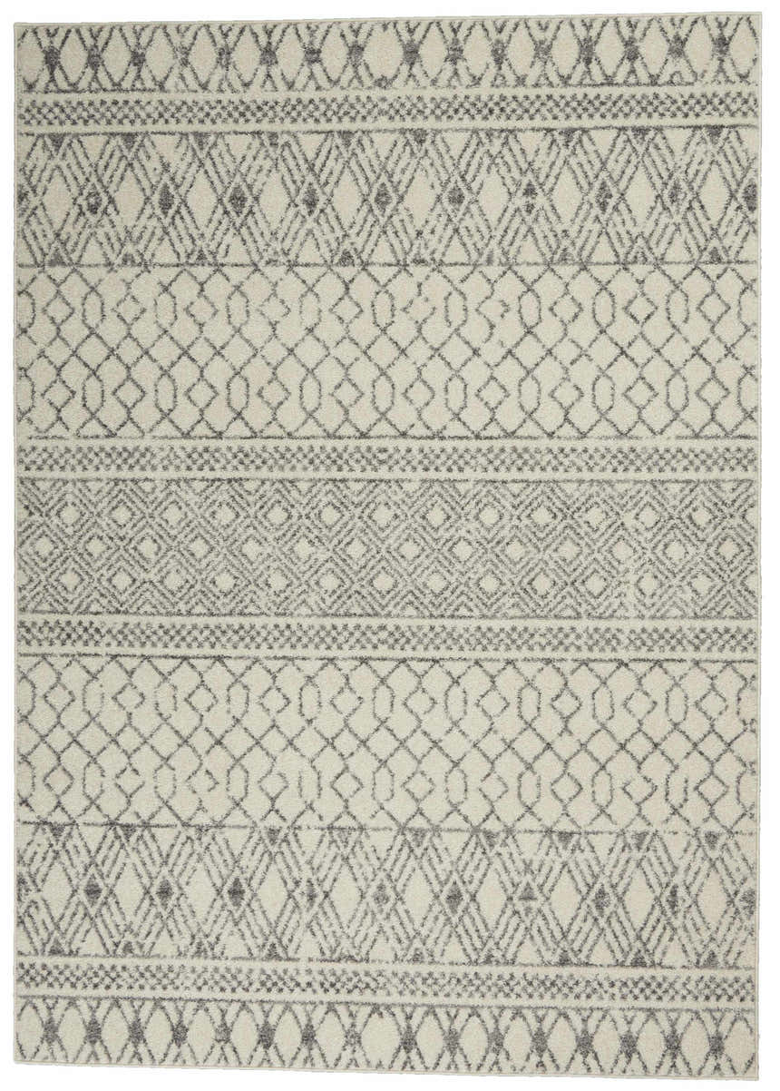 Close-up of Nourison Passion Ivory Grey Bohemian Area Rug. Geometric patterns in chestnut on soft ivory. Machine made.