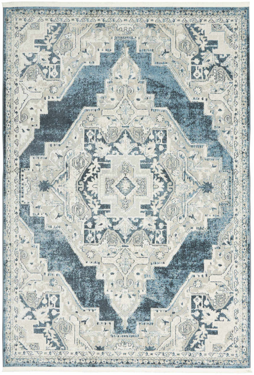 Close-up of the Nourison Carina Blue Grey Vintage Indoor Area Rug, featuring a distressed geometric pattern.