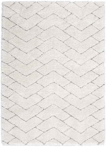 Close-up of the Nourison Dreamy Shag Ivory Grey Rug. Soft shag texture with a subtle geometric chevron pattern.