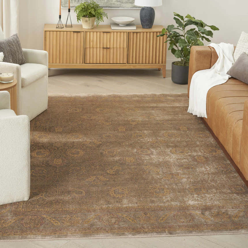 Living room with a brown leather sofa and Luxurious Taupe Vintage Indoor Area Rug.
