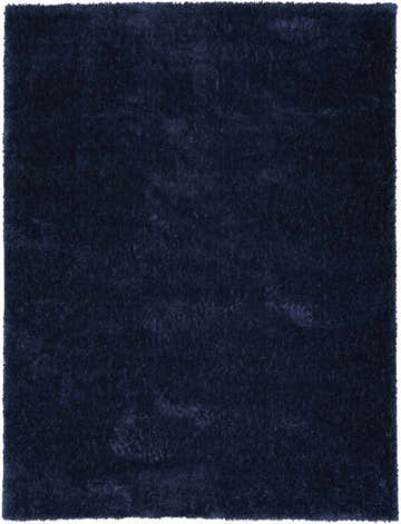 Close-up of the plush texture of the Nourison Pacific Shag Navy rug. Deep navy color.
