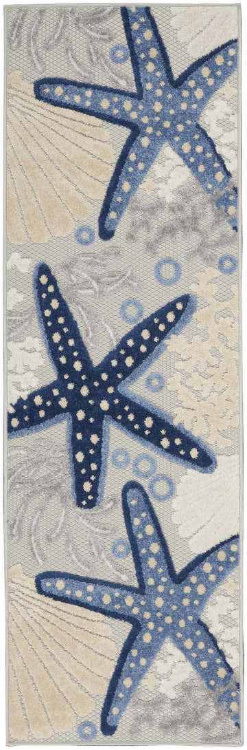 Close-up of Nourison Aloha Blue Grey rug featuring starfish, seashells, and bubble design in blue, gray, and beige.