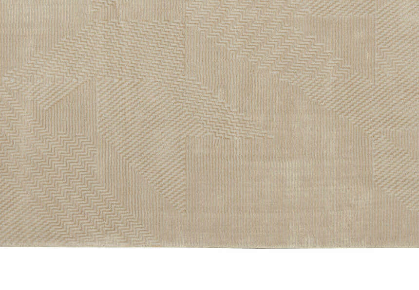 Close-up of the Calvin Klein Orlando rug in grey saffron. Modern design with geometric patterns and subtle texture.