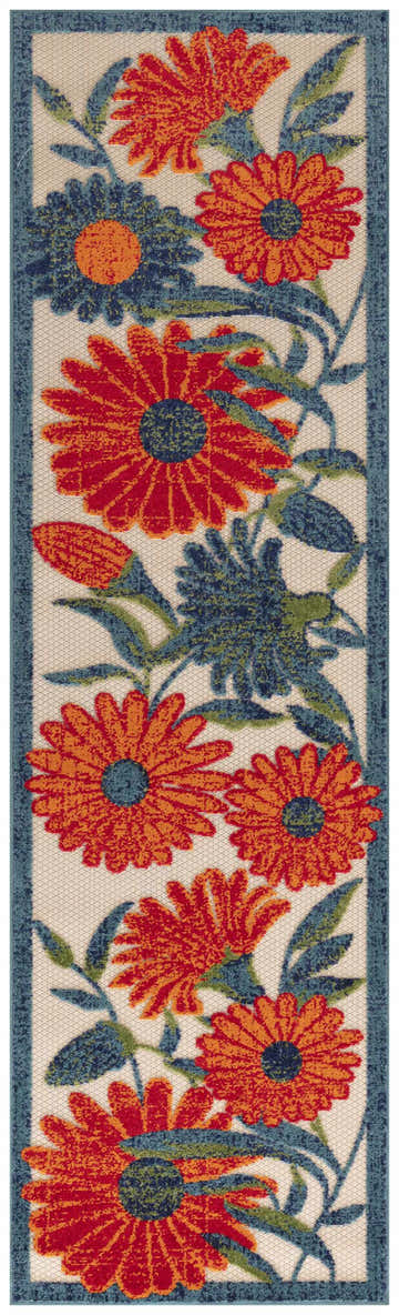 Close-up of Nourison Aloha Ivory Multicolor Outdoor Area Rug with floral pattern and chestnut, blue, and green colors.
