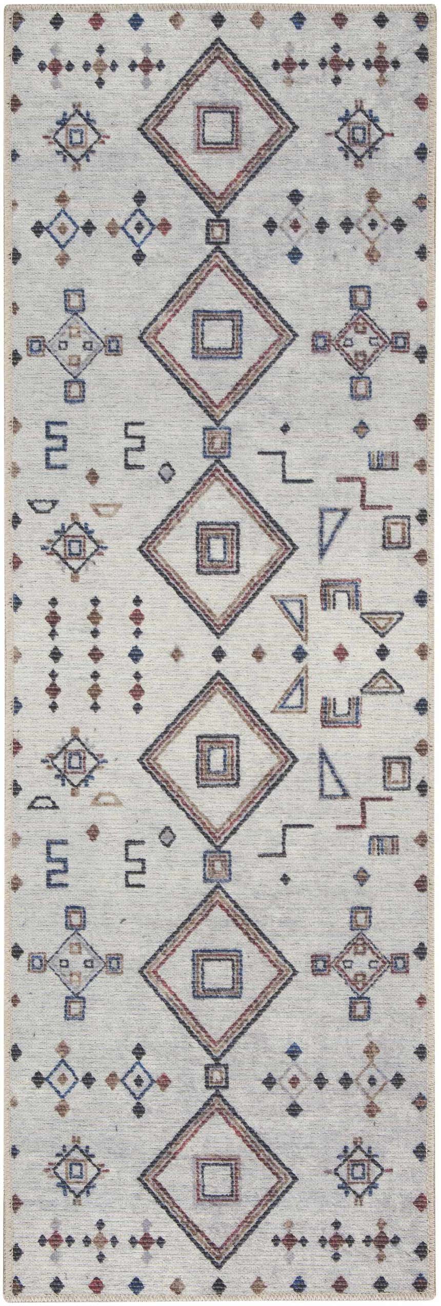 Close-up of Nourison New Concept Ivory Multicolor Bohemian rug. Geometric diamond pattern in chestnut, red, and blue on ivory.