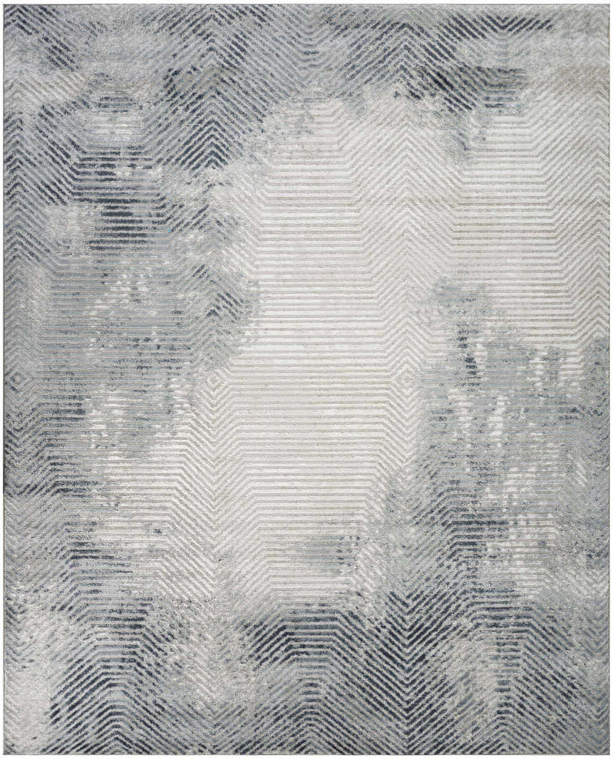 Close-up of the Nourison Dekor Grey Navy rug featuring a modern geometric pattern and high pile texture.
