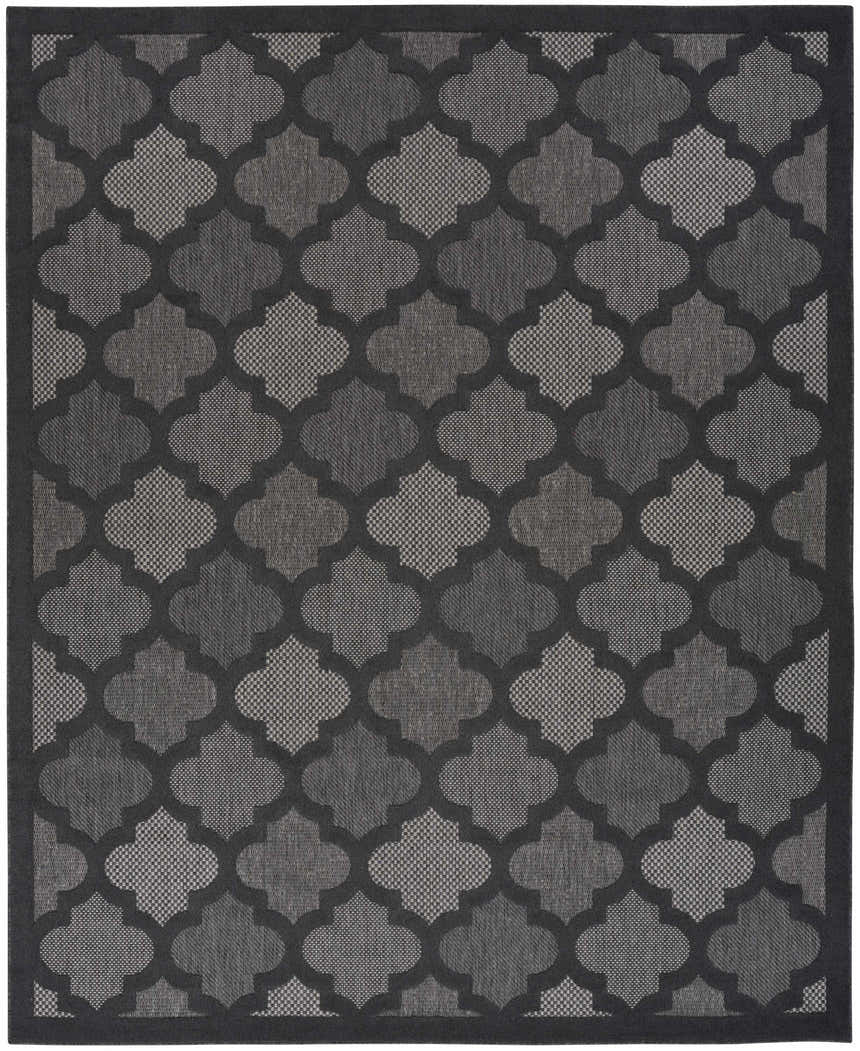 Close-up of the Nourison Easy Care Charcoal Black rug featuring a taupe quatrefoil pattern.