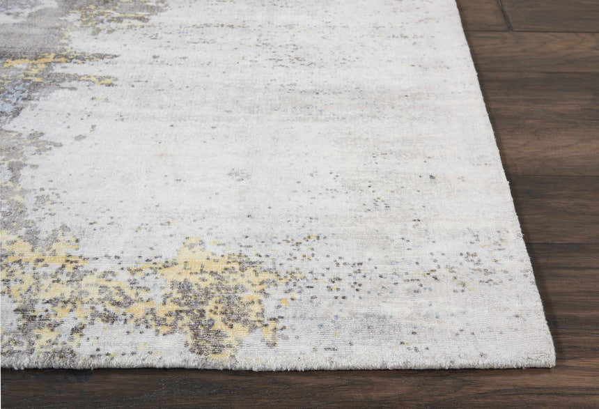 Close up of Nourison Safari Dreams Ivory Gold Painterly rug showing painterly design and texture.