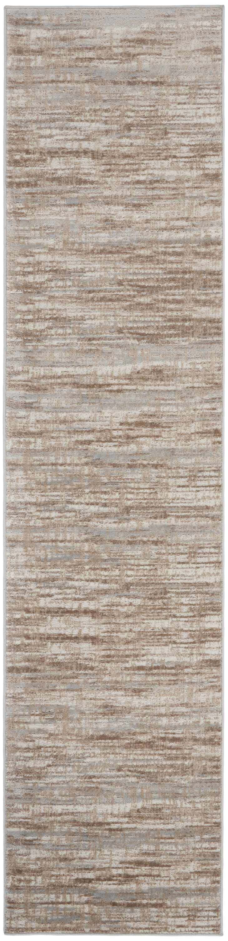 Close-up of the Nourison Elation Ivory Grey rug. Abstract design with chestnut, ivory, and grey hues. High pile texture.