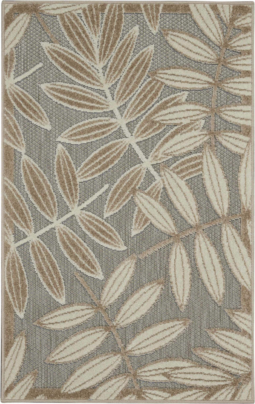 Close-up of Nourison Aloha Natural Tropical Area Rug. Brick red leaves on a neutral textured background.