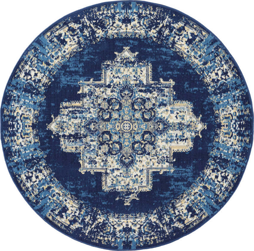 Close-up of the round Nourison Grafix Navy Blue Vintage Area Rug, featuring a distressed, ornate medallion pattern.