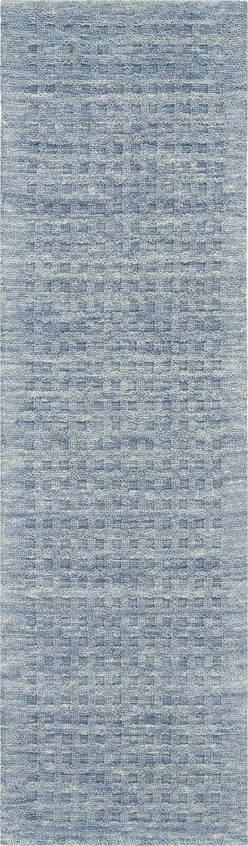 Close-up of the Nourison Marana Denim rug, featuring a textured, contemporary woven pattern in shades of blue.