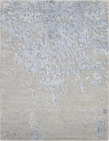 Close-up of the Nourison Silk Shadows Grey Blue rug showing its abstract pattern and silk-like texture.