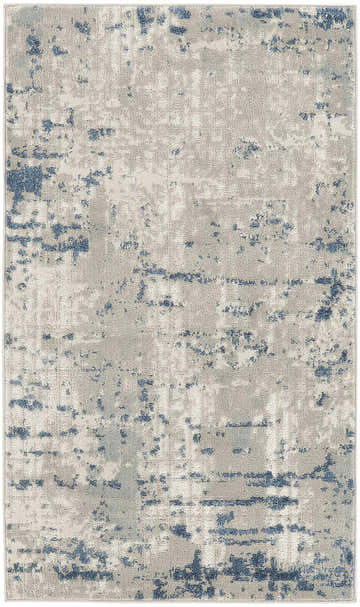 Close-up of the Nourison Quarry Ivory Grey Blue area rug with a modern, abstract design.