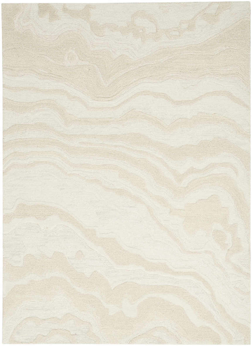 Close-up of Nourison Graceful Ivory rug. Wool rug with a subtle, wavy chestnut pattern. Soft texture.