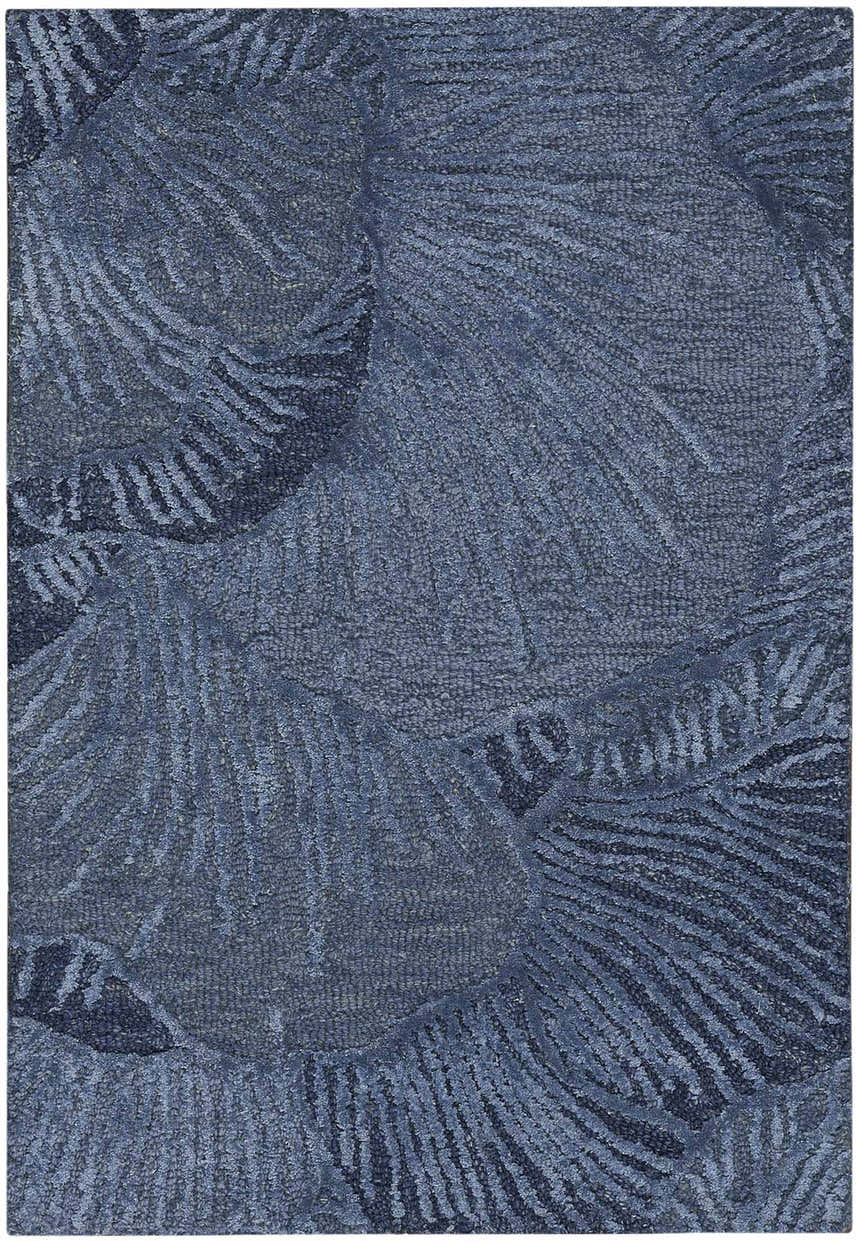 Close-up of the Nourison Avra Blue rug showing a textured, abstract, light blue pattern.