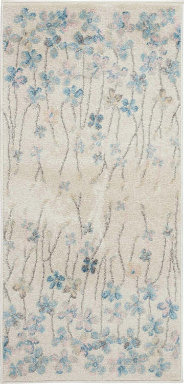 Close-up of Nourison Tranquil Ivory rug with blue and pink floral design, chestnut stems, and soft, plush texture.