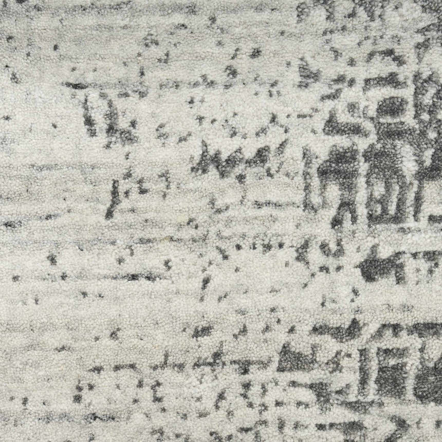 Close up of the Nourison Harmony Ivory Charcoal rug showing texture and abstract pattern.