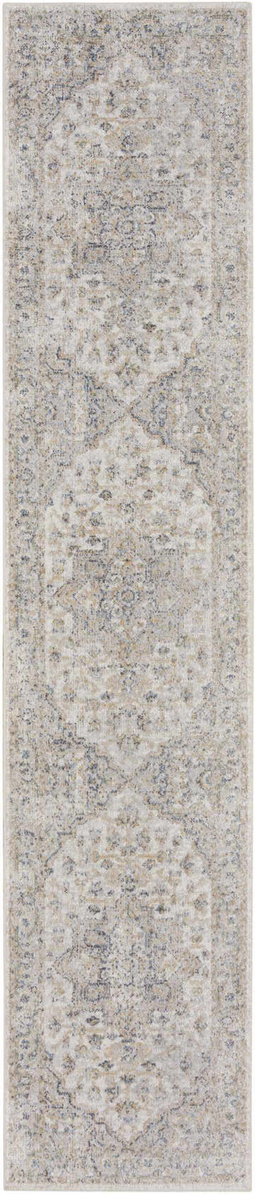 Close-up of the Nourison Astra Silver Grey Vintage Area Rug, showing its distressed pattern and soft, neutral colors.