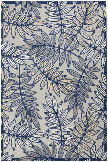 Close-up of Nourison Aloha Ivory Navy Tropical Area Rug featuring a botanical leaf pattern in navy, ivory, and gray. Design-Rectangle