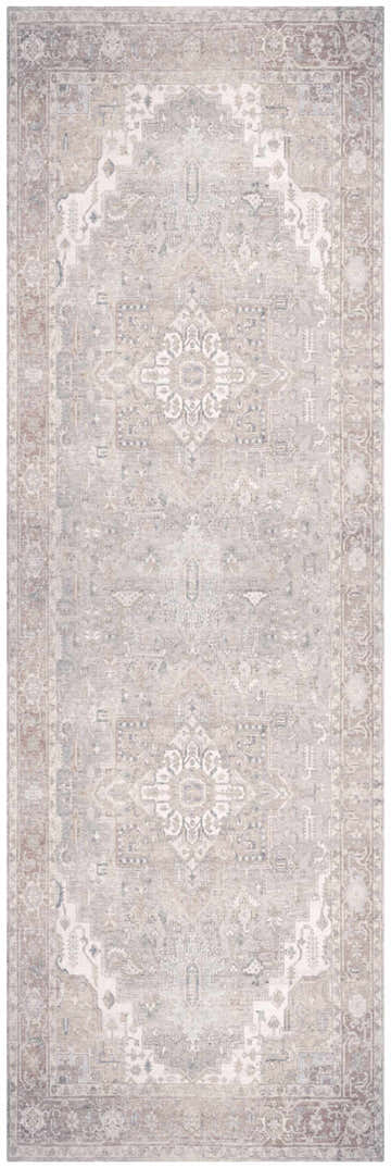 Close-up of the Nourison Vintage Light Blue Washable Area Rug, featuring a faded vintage design and intricate patterns.