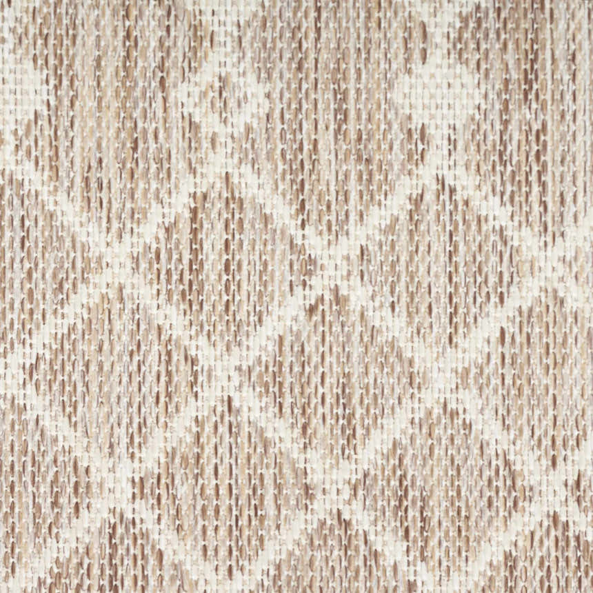 Close-up of the beige Nourison Positano Area Rug showing its woven texture and subtle geometric pattern.