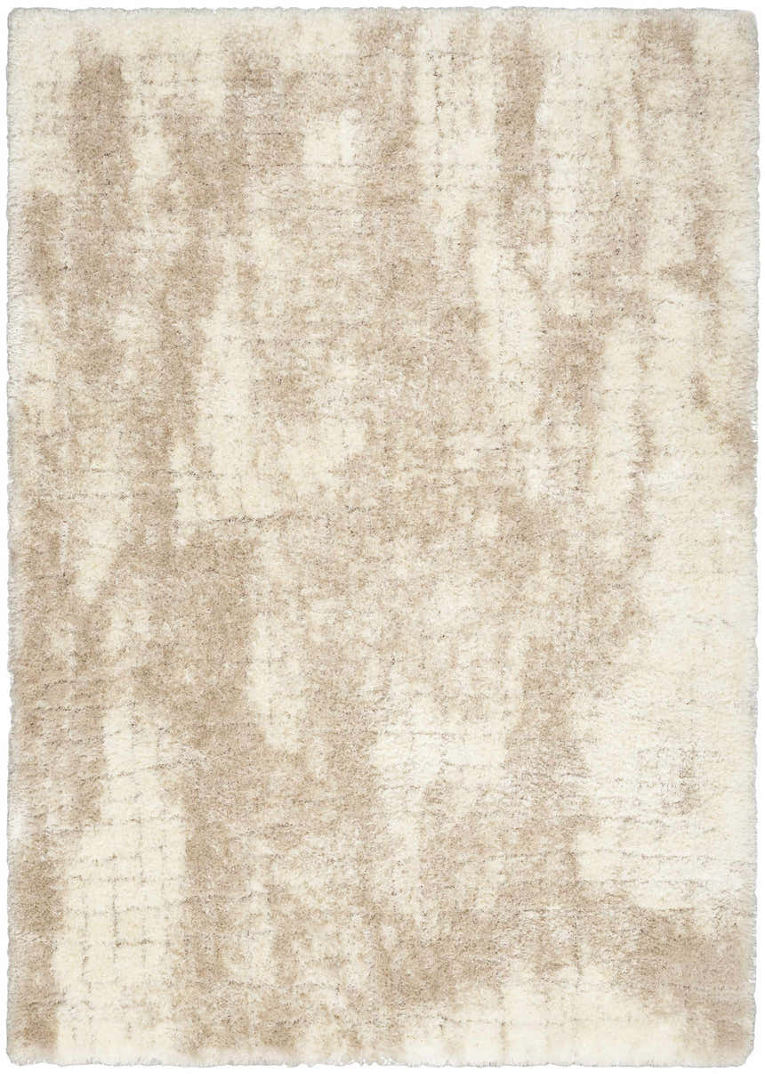 Close-up of the Nourison Dreamy Shag Ivory Beige rug. Soft, plush shag texture with subtle chestnut color variations.