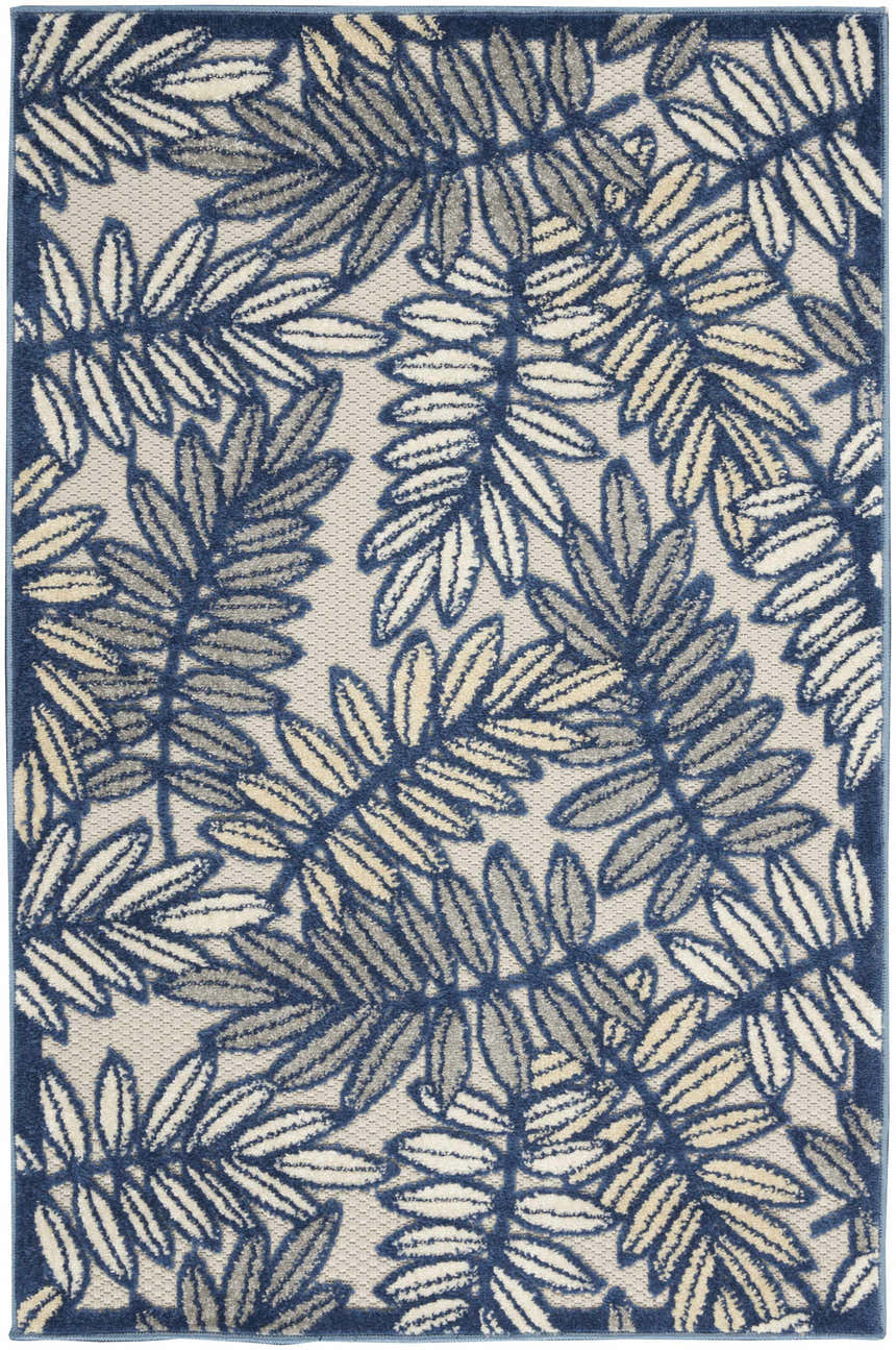 Close-up of the Nourison Aloha Ivory Navy Tropical Area Rug featuring a leaf pattern in ivory, navy, and chestnut.