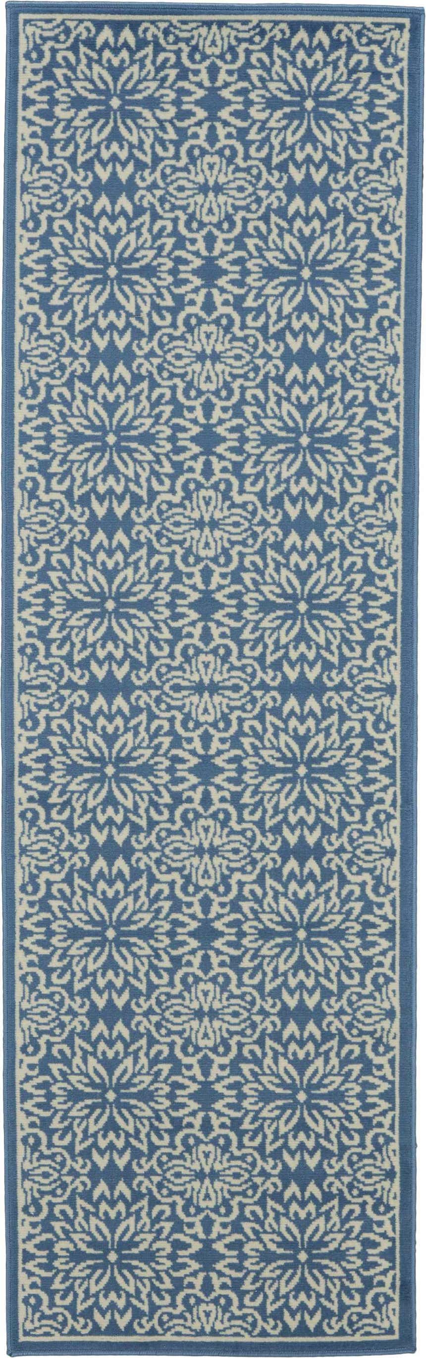 Close-up of the Nourison Jubilant Ivory Blue Farmhouse Indoor Area Rug, featuring a floral pattern and blue border.