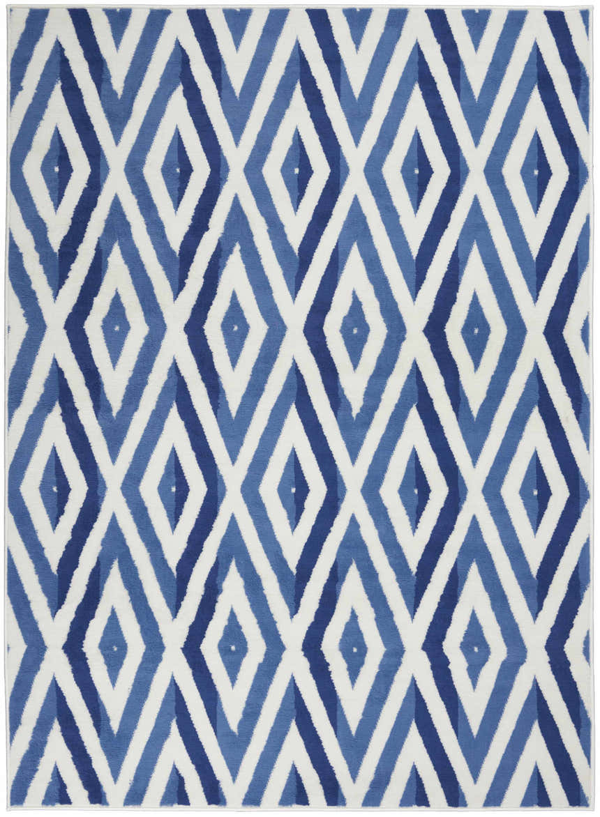 Close-up of the Nourison Whimsicle Ivory Blue rug featuring a modern diamond pattern in shades of blue and white.
