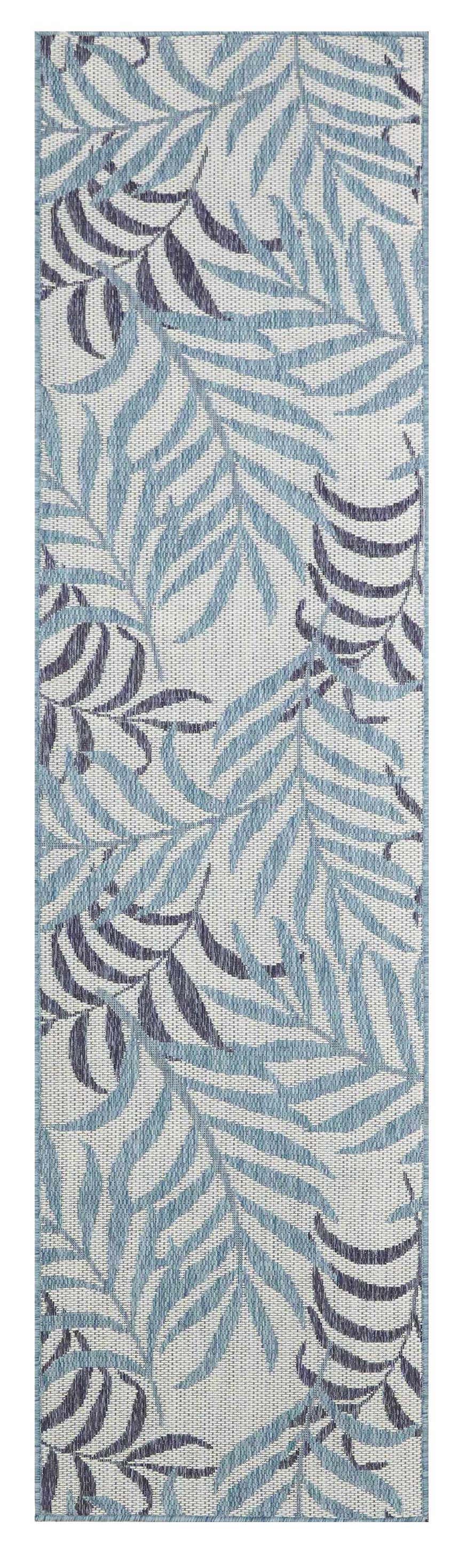 Close-up of Nourison Garden Oasis Blue Tropical Area Rug featuring a light blue and navy leaf pattern.
