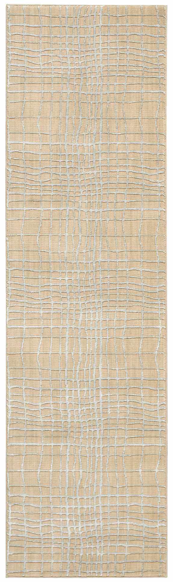 Close-up of Nourison Nepal Manilla Vintage rug. Manilla-colored wool rug with a grid-like vintage pattern.