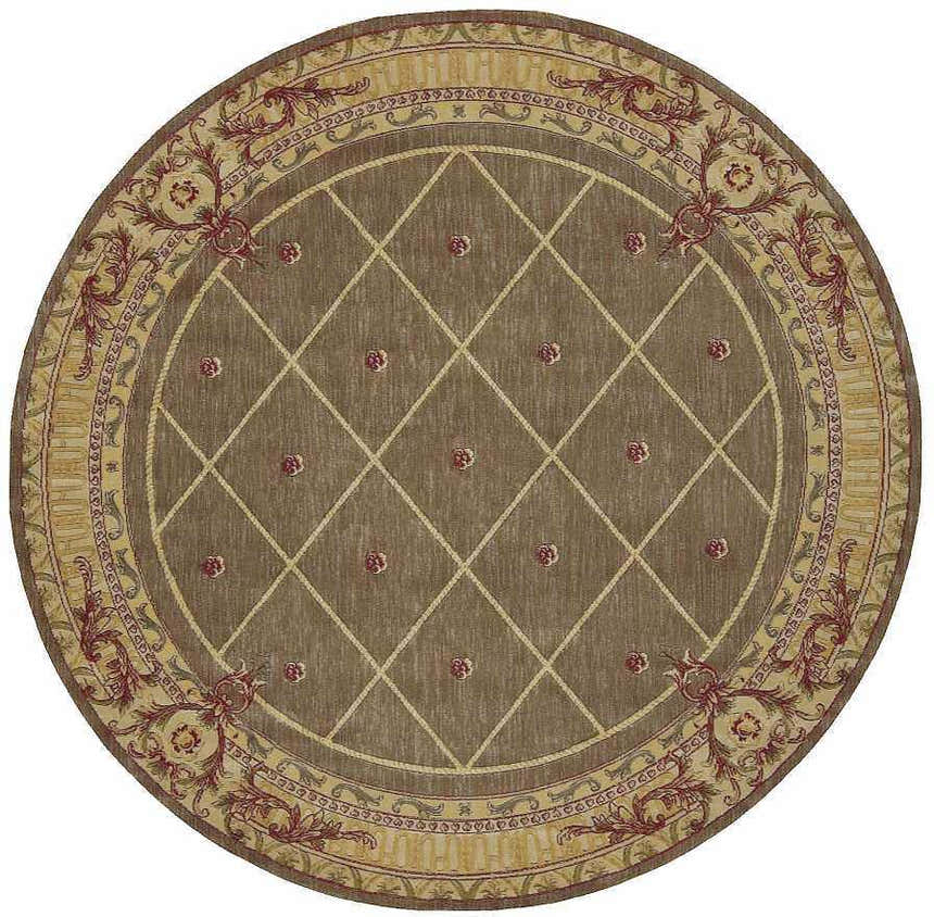 Close-up of round Nourison Ashton House Cocoa rug. Features a diamond pattern and floral border in camel, red, and green.