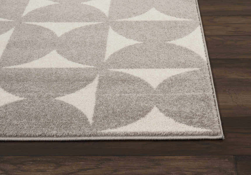 Close up of the grey and white geometric Nourison Harper area rug.