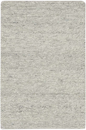 Close-up of the handmade Nourison Alanna Silver area rug. Features a looped wool texture in light silver gray.