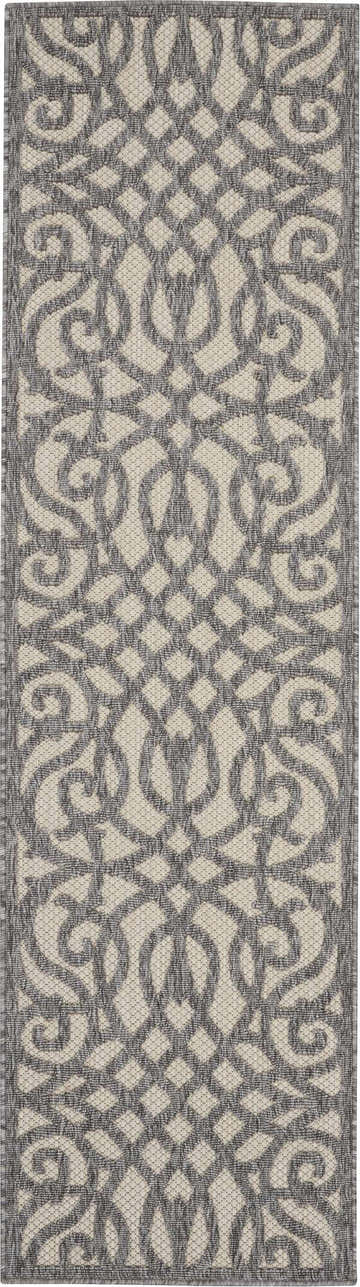 Close-up of the Nourison Cozumel Cream Grey Farmhouse Area Rug featuring a cream and gray geometric pattern.