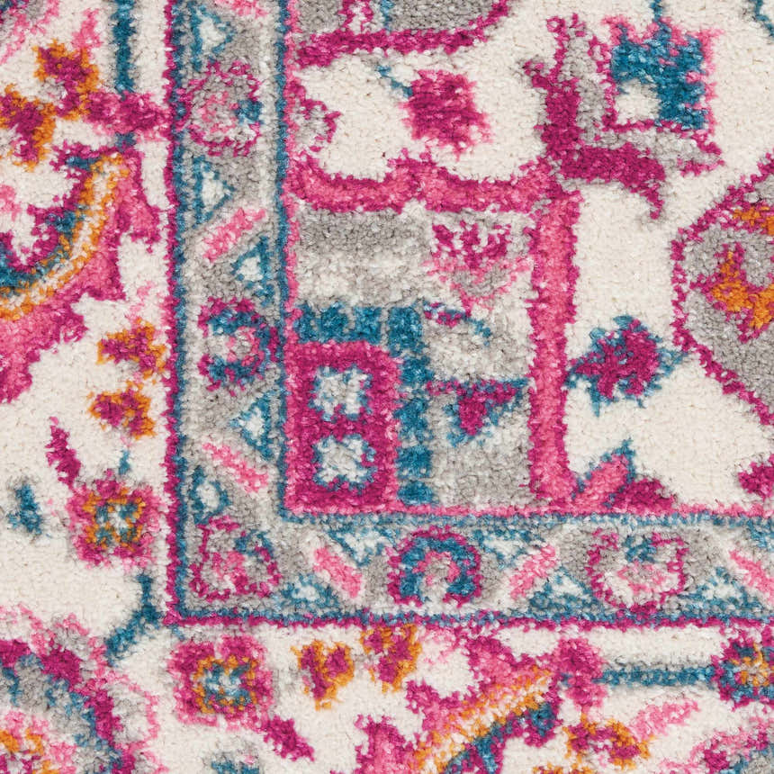 Close-up of Nourison Passion Light Grey Pink Bohemian Indoor Area Rug with a detailed floral and geometric pattern.