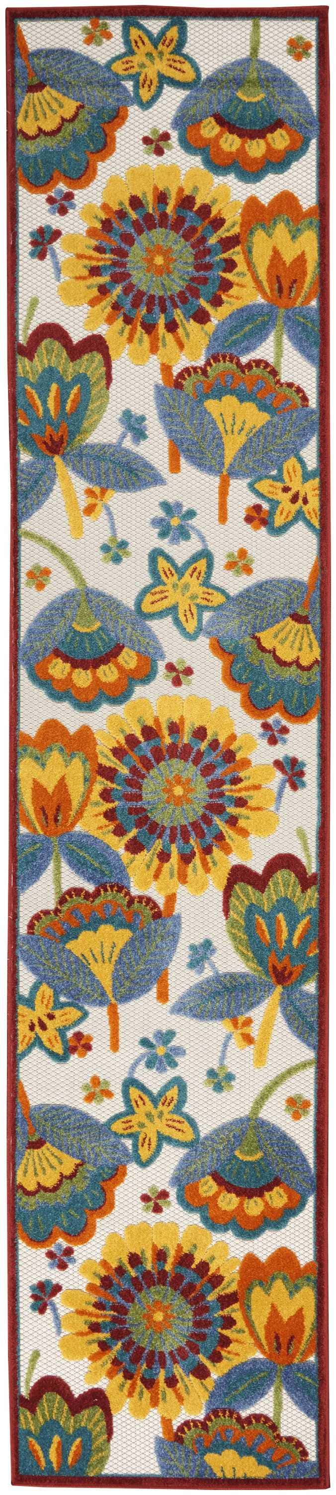 Close-up of the Nourison Aloha Multicolor Area Rug, featuring a bright floral pattern in yellow, blue, orange, and red.