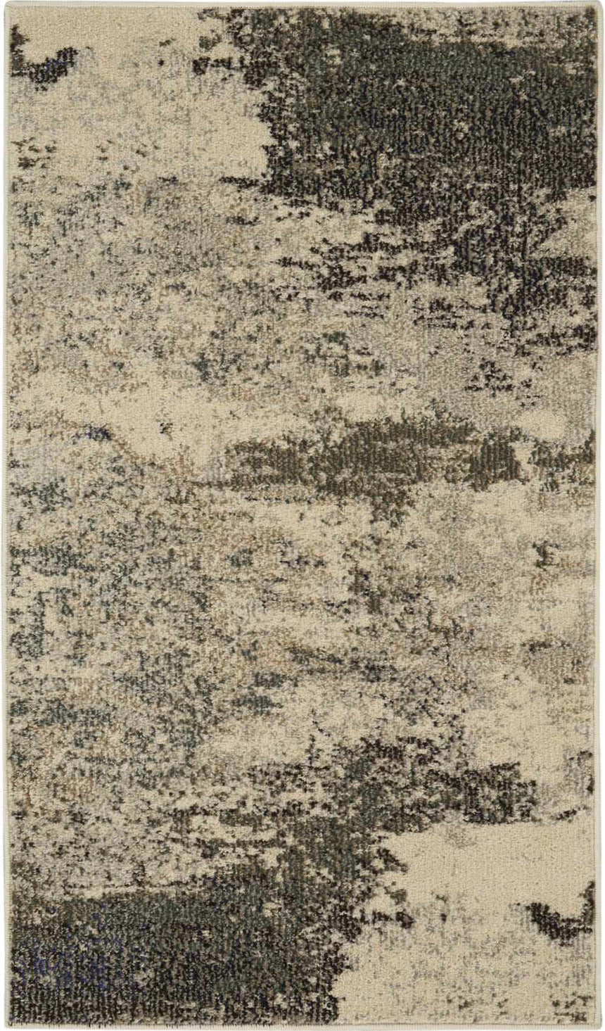 Close-up of Nourison Celestial Ivory Grey rug. Abstract design with chestnut, ivory, and gray tones. Machine-made polypropylene texture.